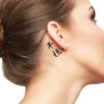 behind the ear kanji Tattoo Idea 'Peaceful'